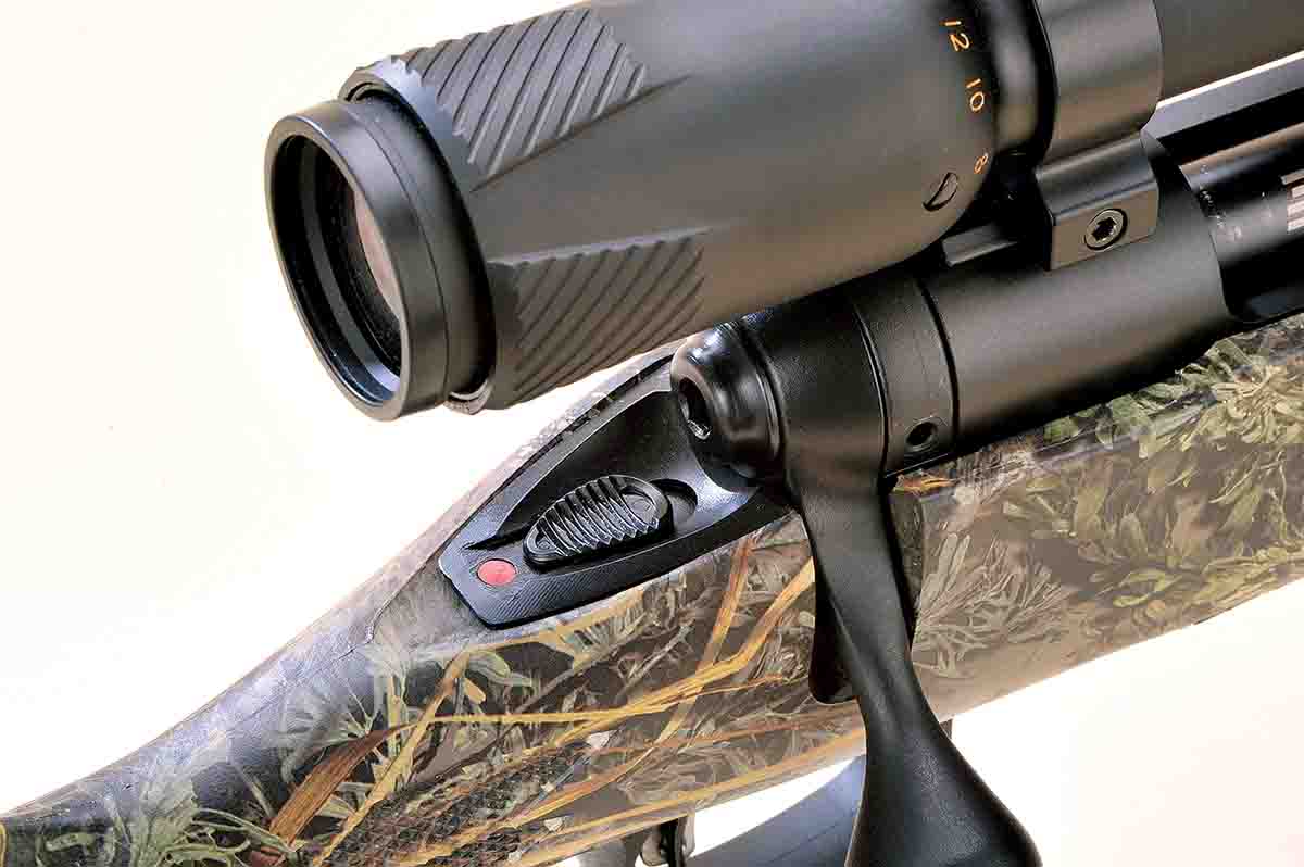The rifle features a three-position tang safety favored by many shooters, especially left-handed hunters who use right-handed rifles. Forward is “fire”; the midpoint position allows the bolt to be opened and cartridges removed; all the way back is full “safe.”